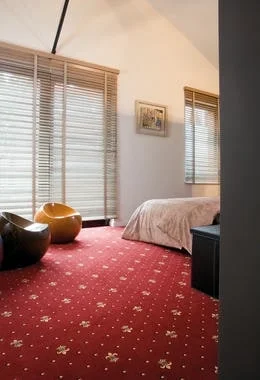 Red & Golden Carpet in a Bedroom